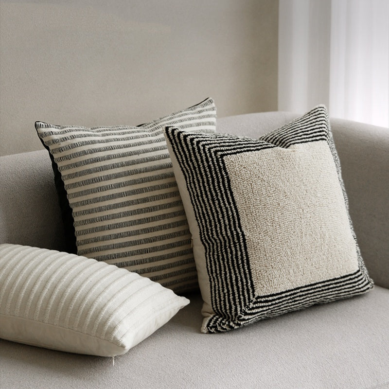 ESSENCE Frame, Pinstripe and Ivory Rib Lumbar pillows styled together